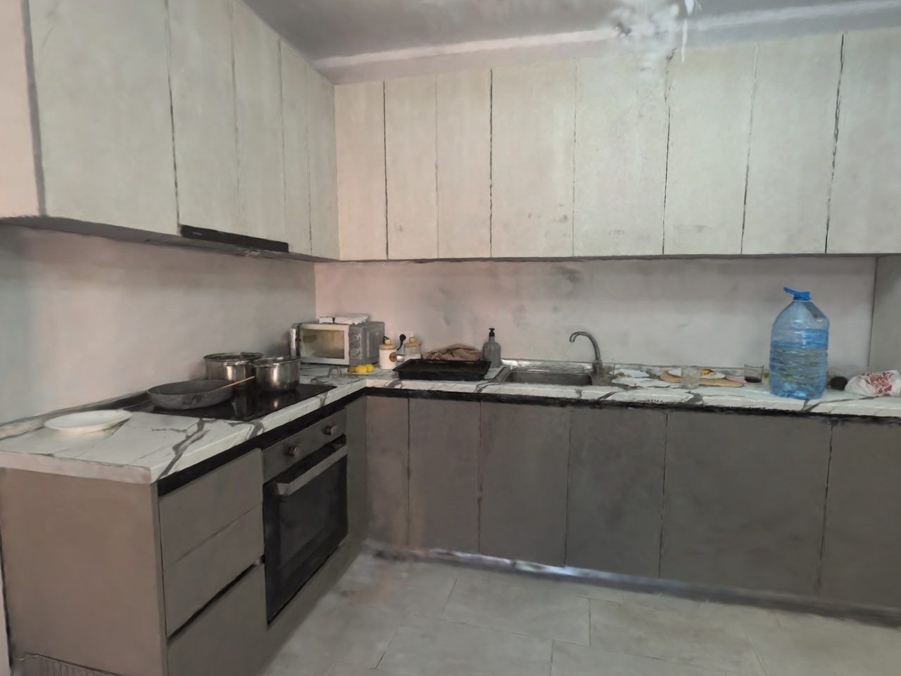 A kitchen in a Wanderspace 3D tour filmed on a phone, seen at eye level